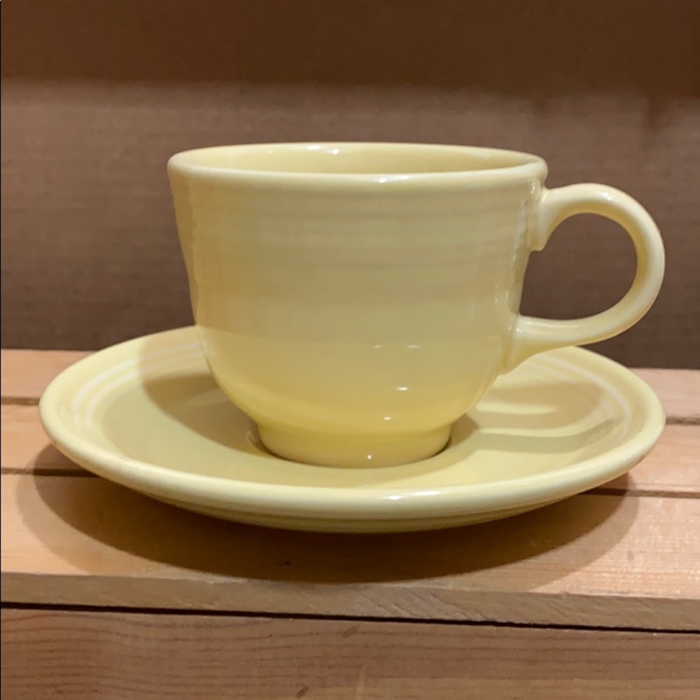 Fiesta ware coffee cup with saucer - light yellow